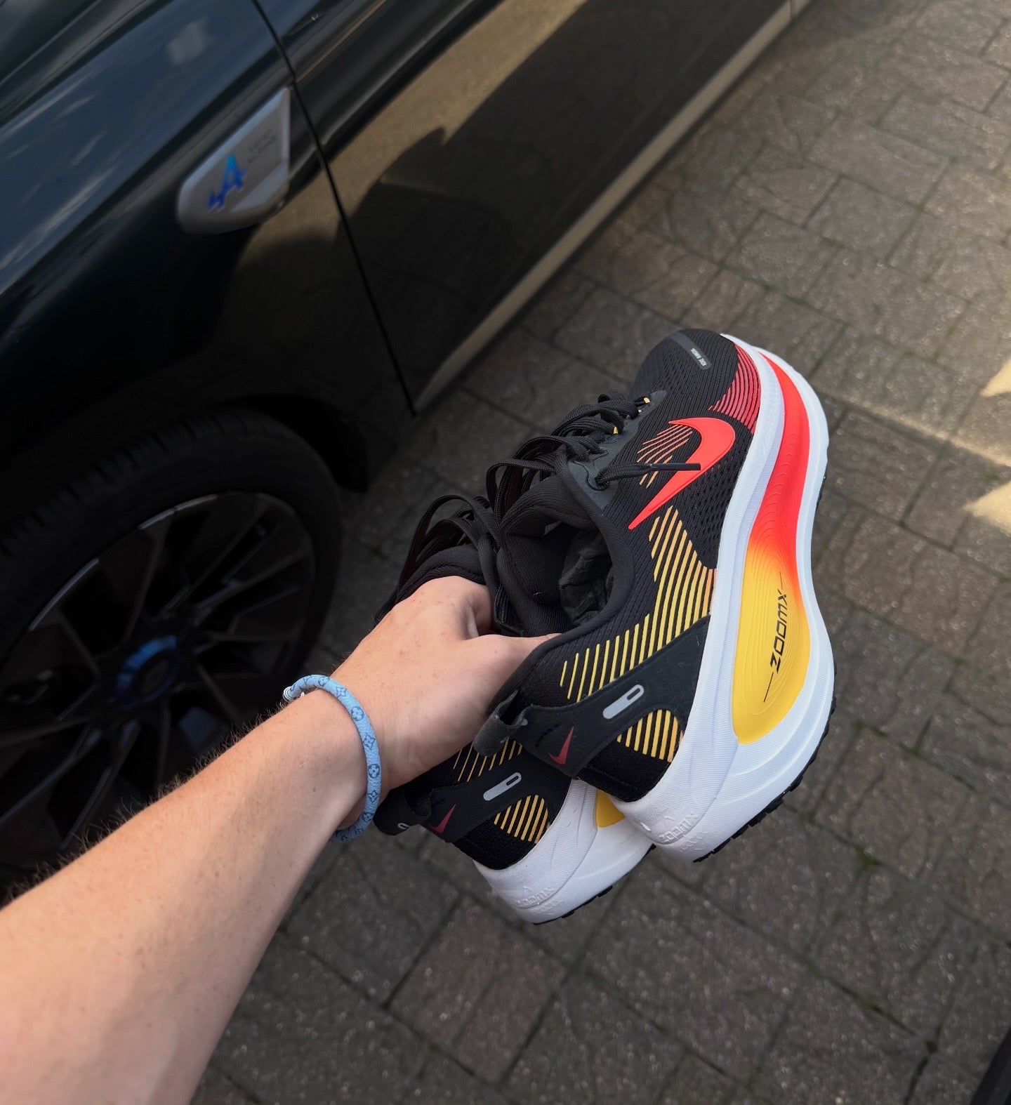 Nike Vomero 18 Black Crimson Topaz Gold